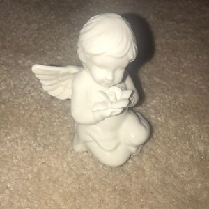 Porcelain angel with Lilly figurine